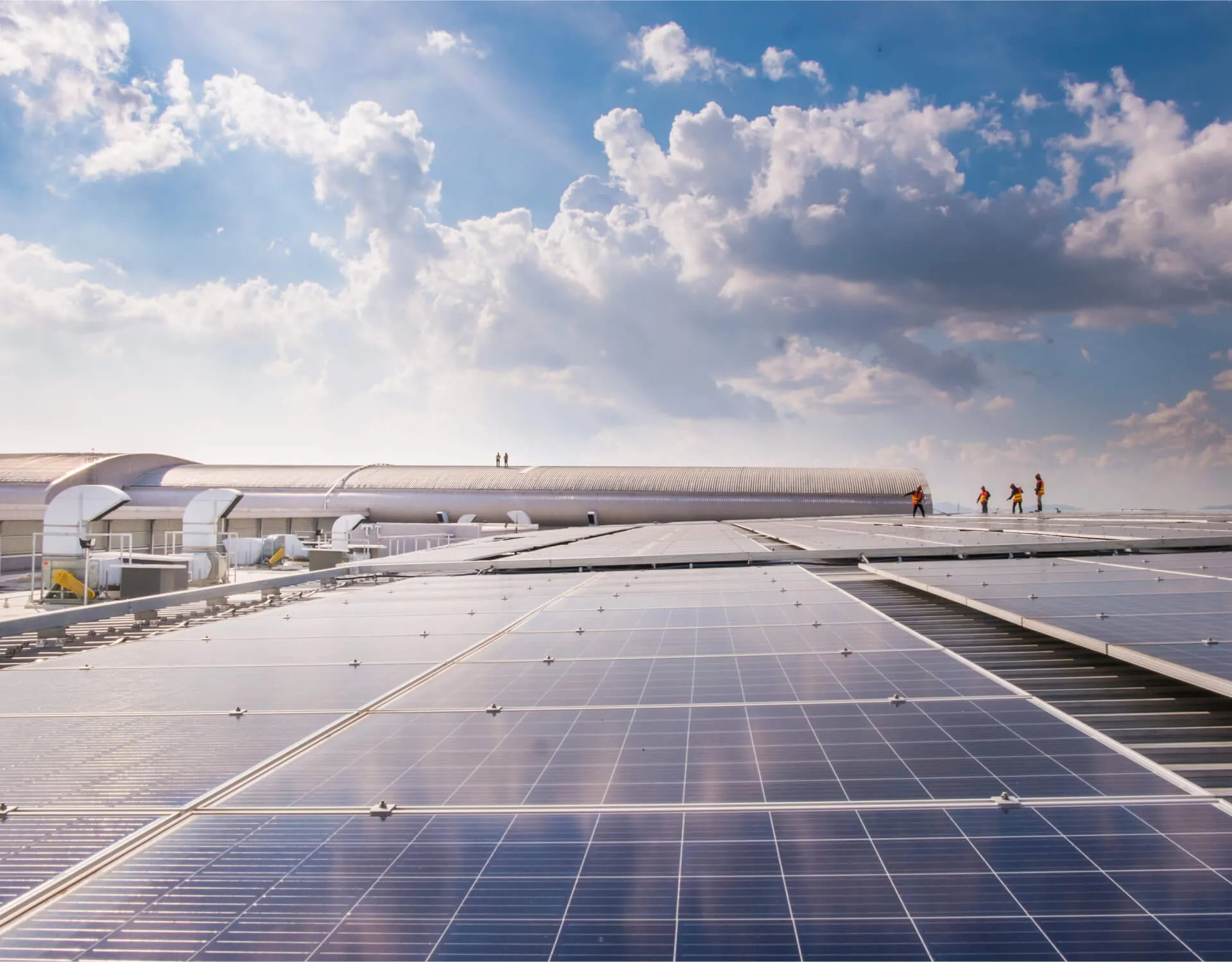A man installing solar equipments.