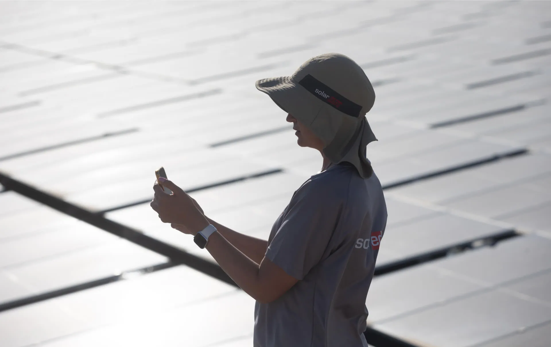 A man installing solar equipments.